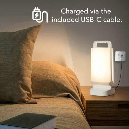 Bedside lamp with USB-C charging on a nightstand.